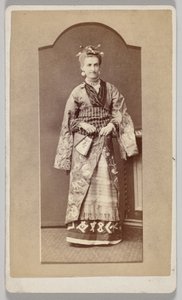 Untitled (white woman in Japanese kimono with fan) by Unknown artist