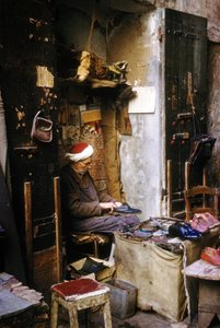 A Cobbler, Algiers by Unknown photographer
