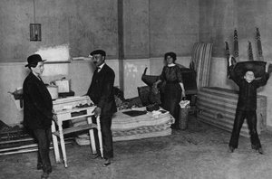 Everyday life, scene of moving in a building in Paris. Photography, late 19th century, Paris. Coll. Selva
