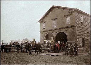 Fire brigade posing in front of the barracks, Alexandria. Virginia, United States. 1863. Photography by Unknown photographer
