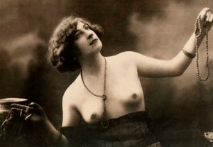 Half-length portrait of a partially nude young woman by Unknown photographer