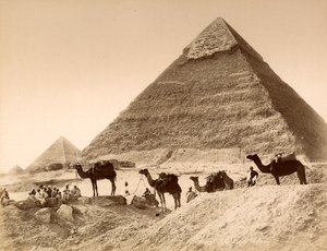 Men and camels in front of the pyramid of Chefren by Unknown photographer