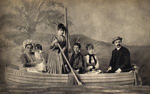 Portrait of a family with a photographer, staged in a boat. Photography, late 19th century, Paris. Coll. Selva
