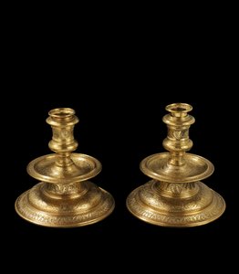 Pair of candlesticks of engraved brass, with later reworking, gilding and addition of removable sockets and wood bases, 1500-25 by Venetian School