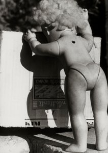 Abandoned Doll Next to a Box