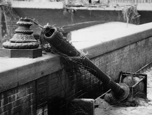 Street lamp broken off by the force of the flood waters in Florence, November 1966