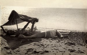 Two Women Lying on the Sea Shore in the Shade of a Towel. Postcard Sent by the Photographer to Vincenzo Balocchi