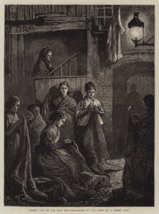 London Life at the East End, Sack-Making by the Light of a Street Lamp by William Bazett Murray