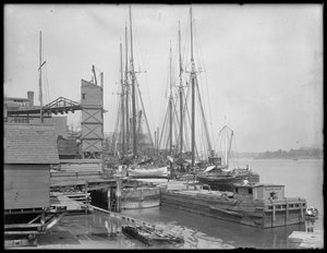 Docks and Boats on Unidentified Waterfront, possibly Harlem River, Inwood, New York, c.1910 by William Davis Hassler