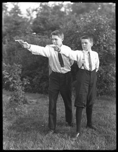 Two Unidentified Boys Pose Aiming Pistols, July 1915