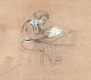 Schoolboy at work on his desk by . .