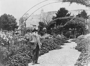 Claude Monet in his garden at Giverny, 1925