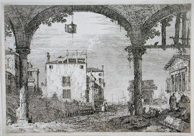 View through an arcade towards coastal buildings by Canaletto