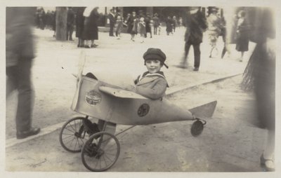 Boy in a Toy Aircraft by (after) English photographer