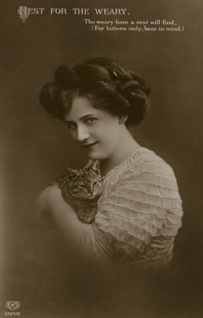 Girl with kitten by (after) English photographer