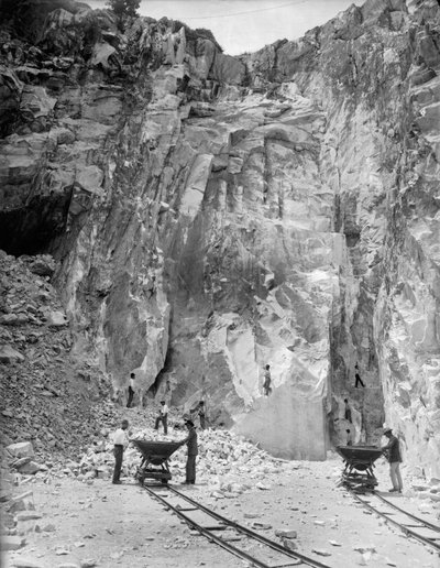 Excavators at work at a marble quarry in the Apuan Alps, in Tuscany (b/w photo) by A. Corsini