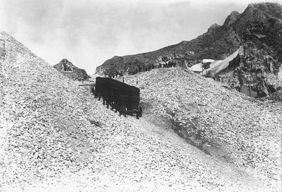 Transport of an enormous convoy containing marble, along a road near a quarry in the Apuan Alps, Tuscany by A. Corsini