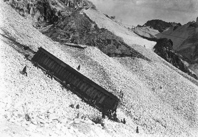 Transport of an enormous convoy containing marble, along the cliffs near a quarry in the Apuan Alps, Tuscany by A. Corsini