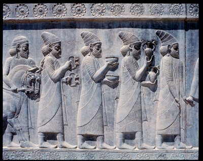 View of the reliefs of eastern stairs: Assyrian ambassadors bringing offers and presents by Achaemenid