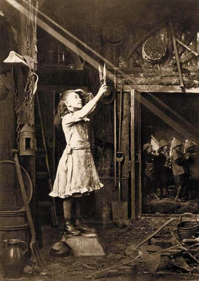 Girl cutting a Sunbeam by Adam Diston