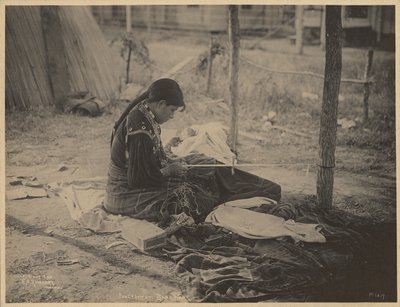 Woman of the Meskwaki Nation Engaging in Beadwork by Adolph F. Muhr