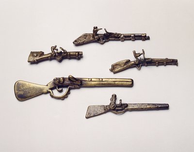 Gold weights cast in the form of guns by Akan School