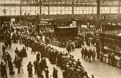 A Queue of Holiday-Makers Waiting for Trains at Waterloo Station, London by Alfieri