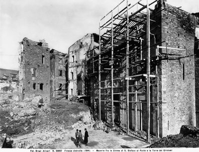World War II: Damage caused by the bombing between the Church of Santo Stefano al Ponte and the Girolami Tower, in Florence. This photograph was formerly part of the Brogi Collection, but now belongs to the Alinari Collection by Fratelli Alinari