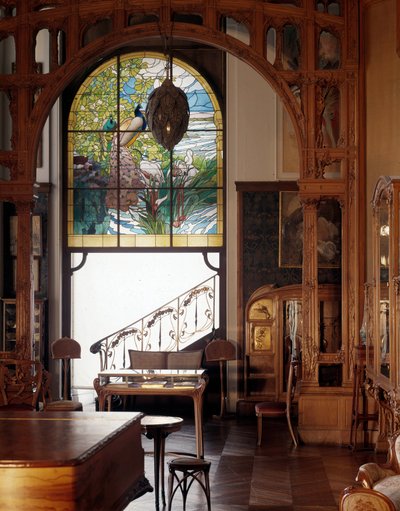 Art Nouveau: view of an apartment Modern style with stained glass by Alphonse Mucha, Musee des Arts Decoratifs Paris by Alphonse Mucha