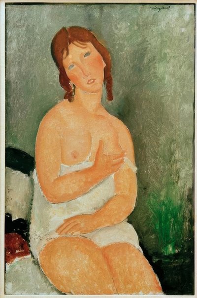 Young Woman Sitting by Amedeo Modigliani