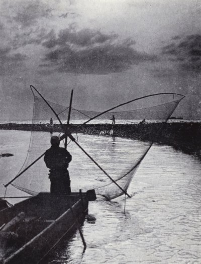 A Japanese Fisherman Drawing His Net by American Photographer (after)