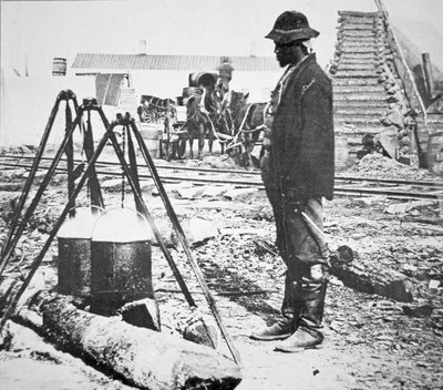 A black cook at a Union Army camp during the American Civil War by American Photographer