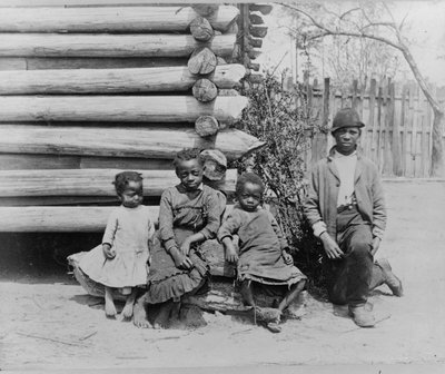 African American man with children near Thomasville, Georgia by American Photographer