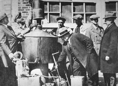 Federal US agents discover an illegal alcohol still during the American Prohibition (1920-33) by American Photographer