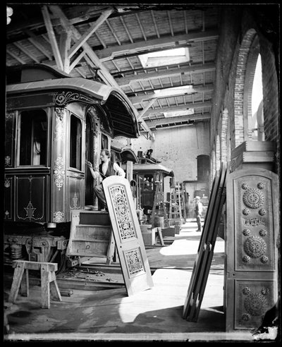 Interior View of Men Working in Paint Shop of Pullman Palace Cars Factory, believed to be in Detroit, Michigan by American Photographer