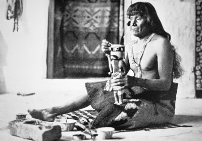 Man making a Kachina Doll by American Photographer