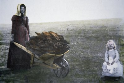Pioneer woman collecting cattle dung, Kansas, c.1880 by American Photographer