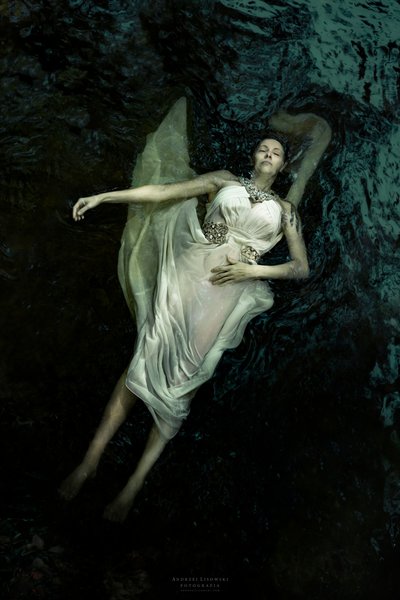 Serene Woman Floating by Andrzej Lisowski