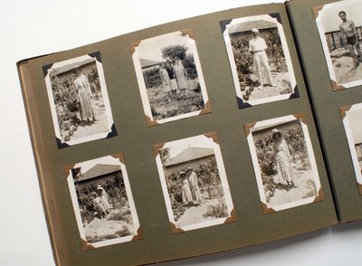 Still life of a photo album around 1925 by Anonymous Anonymous