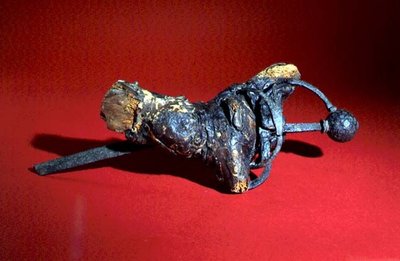 Sword in Root of Tree by Anonymous Anonymous