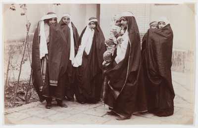 Group of veiled women with a baby by Antoin Sevruguin