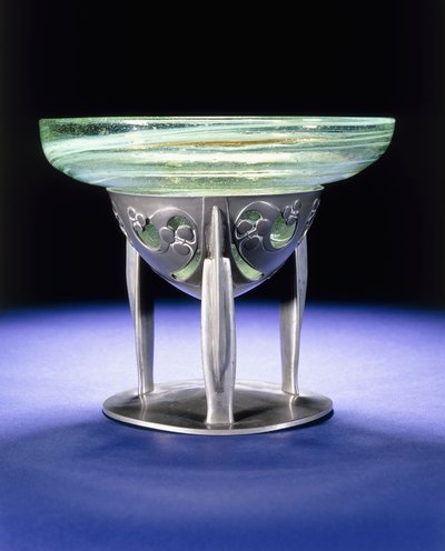 A Liberty Tudric pewter bowl with James Couper & Sons Clutha glass lining, c.1902-05 by Archibald Knox