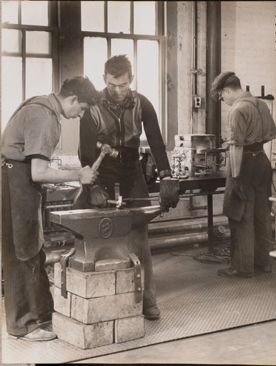 Two Men Hammer Metal on an Anvil by Arnold Eagle