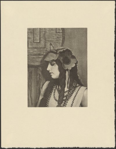 Woman in Bohemian Outfit with Large Flower in Hair by Arthur F. Kales