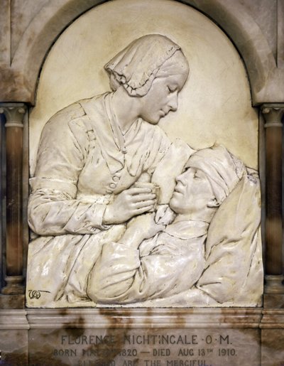 Florence Nightingale comforting a wounded man by Arthur George Walker