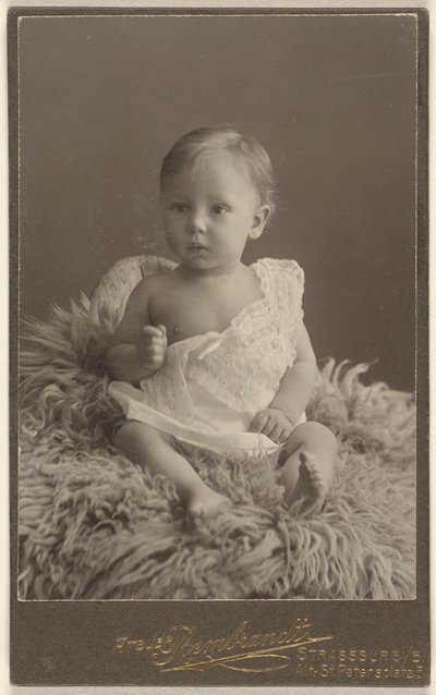 Unidentified Baby Seated on a Lamb-Skin Rug by Atelier Rembrandt