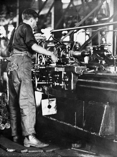 A tradesman making shell casings at a Walsh Island mill, Newcastle, New South Wales, c.1916 by Australian Photographer