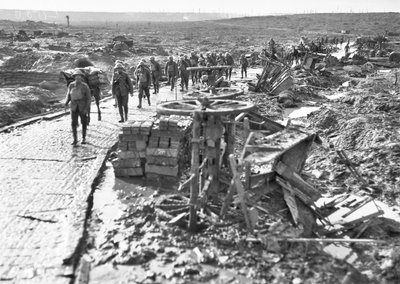Australian troops passing along the track leading to Idiot Corner, at Westhoek Ridge, in the Ypres sector, 28 October 1917 by Australian Photographer