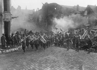 The Band of the 5th Australian Infantry Brigade, Led by Bandmaster Sergeant A Peagam of the 19th Battalion, Passing Through the Grande Place (Town Square) of Bapaume, Playing the Victoria March, Bapaume by Australian Photographer