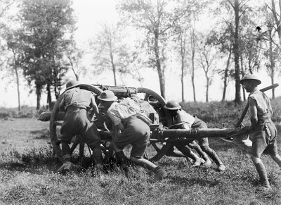 Unidentified members of the 7th Brigade, Australian Field Artillery hauling one of their guns into position near Gressaire Wood, to assist the 9th Infantry Brigade attack near Bray-sur-Somme, 22 August 1918 by Australian Photographer